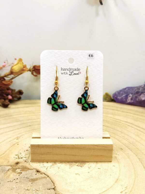 Oorhangers vlinder in metaal groen-blauw
