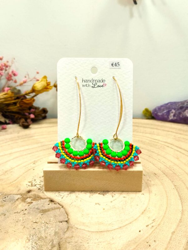 Halfronde oorhangers hematiet en Swarovski parels