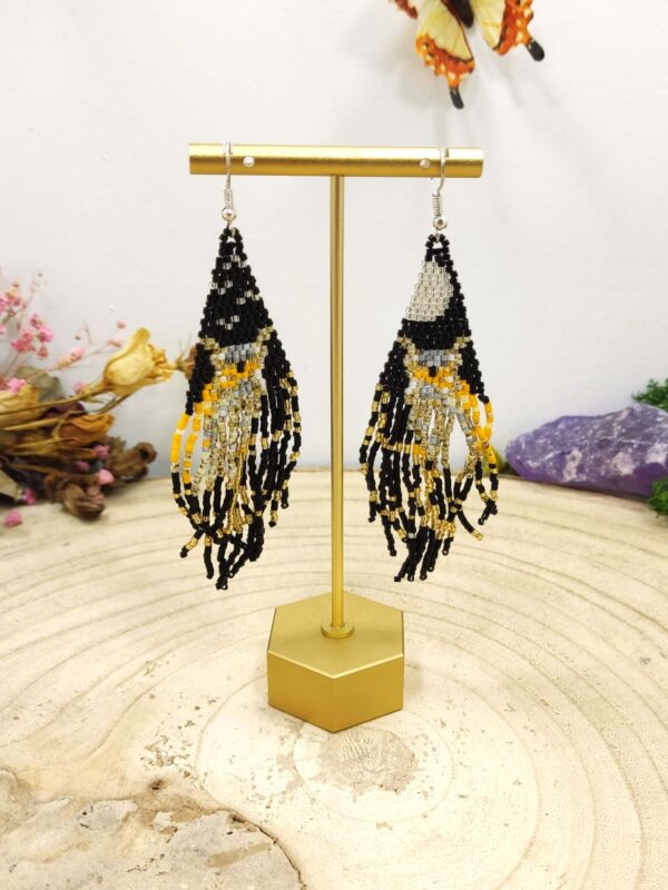 Franje oorhangers uil