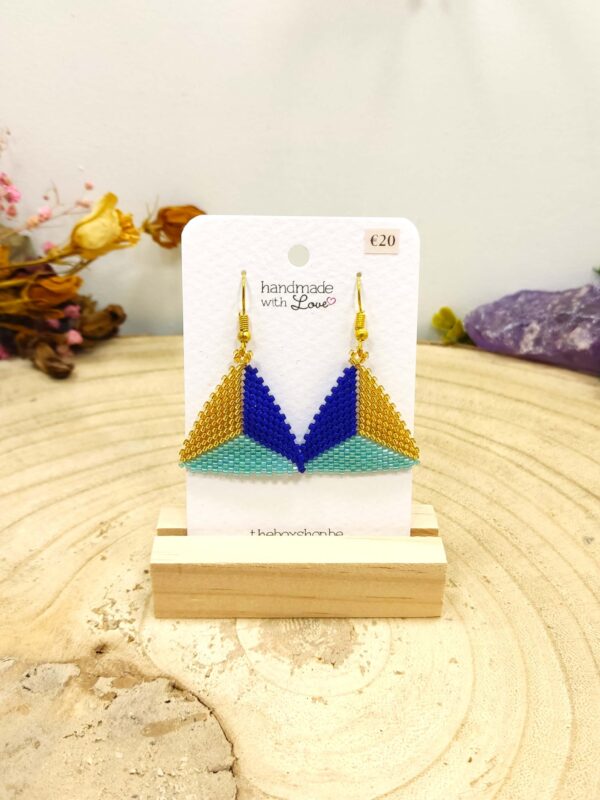 Driehoekige oorhangers goud-blauw
